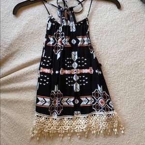 A black, white, teal& orange Aztec tank top